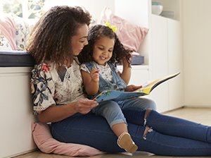 Mother reading to child