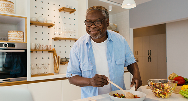 man cooking in a kitchen