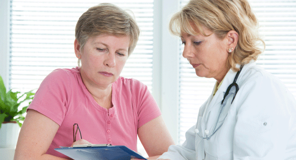 Woman talking to her doctor