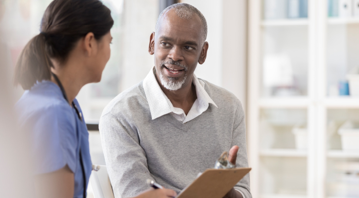 Patient talking with nurse