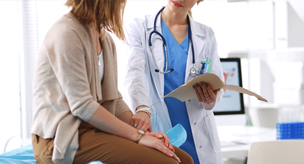 Woman talking to her doctor